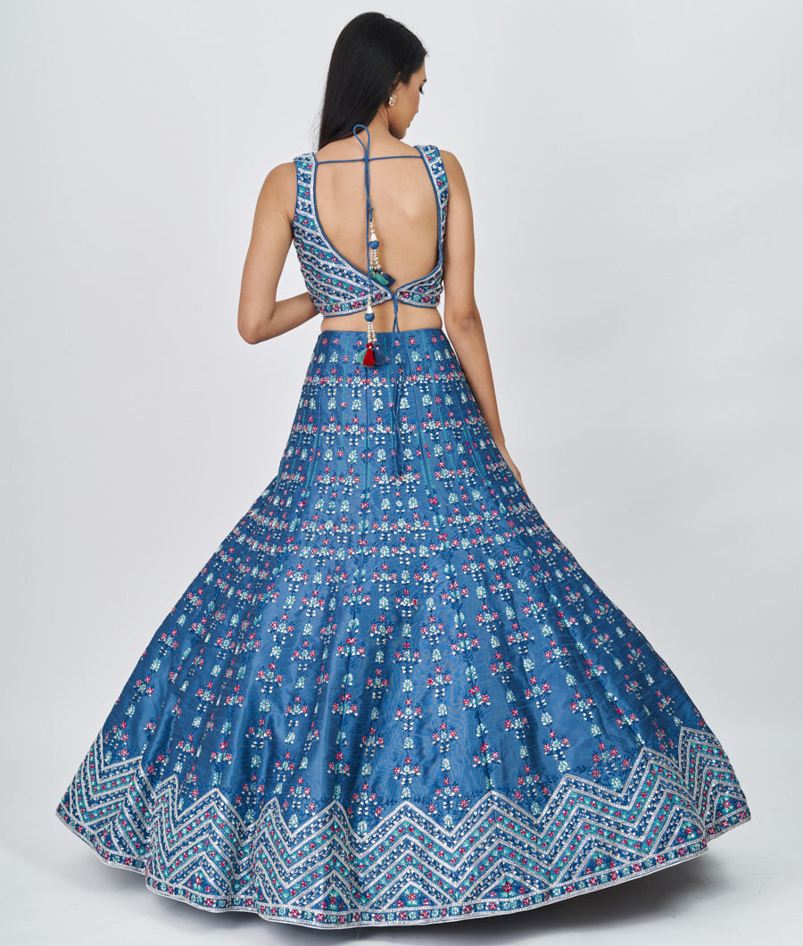 Azure Blue Multi Color Thread Embroidery With Sequins And Gota Patti And Swarovski Stone Work  Lehenga