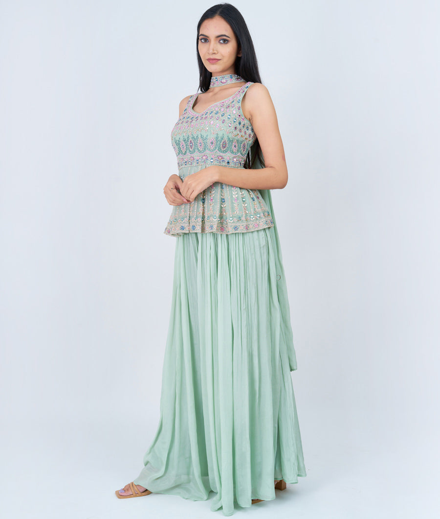 Pista Green Thread And Zari Embroidery With Pearl And Mirror And Sequins And Jarkan Stone Work Peplum Top With Palazzo Set Salwar Kameez